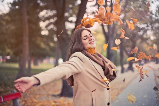 woman with leaves