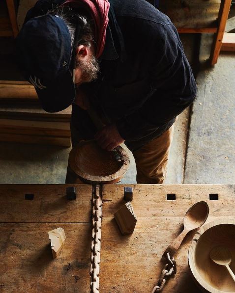 Josh carving bowl out of wood