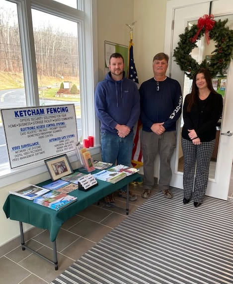 Owner of Ketcham Fencing at Otisville branch with display