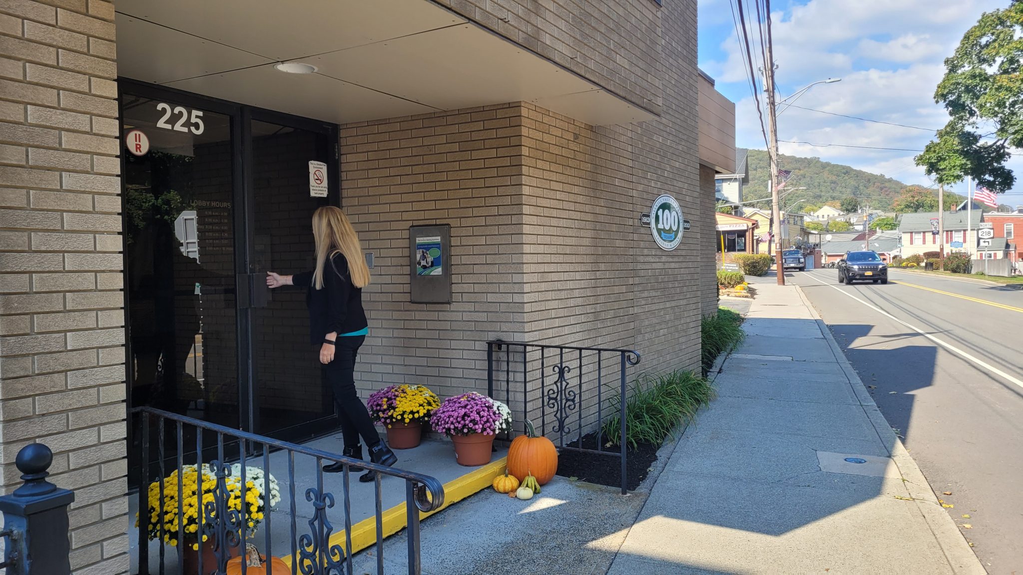 customer walking into Highland Falls Branch